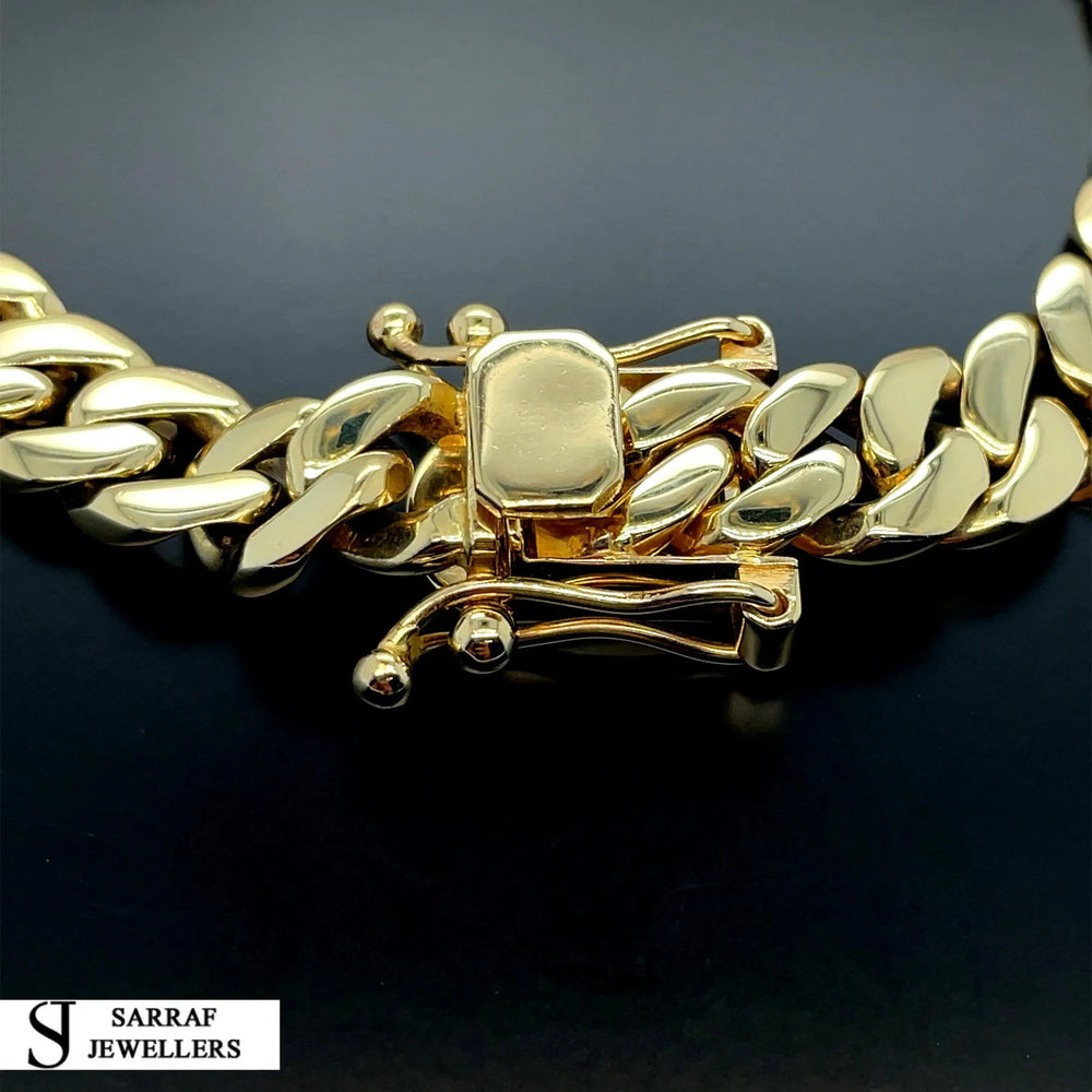 
                  
                    14ct Yellow Gold SOLID CUBAN CHAIN 22 Inches 11mm Wide 153.7g Men's NECKLACE NEW* - Sarraf Jewellers
                  
                