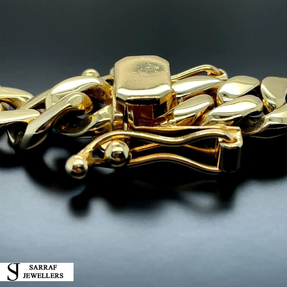 
                  
                    14ct Yellow Gold SOLID CUBAN CHAIN 22 Inches 11mm Wide 153.7g Men's NECKLACE NEW* - Sarraf Jewellers
                  
                