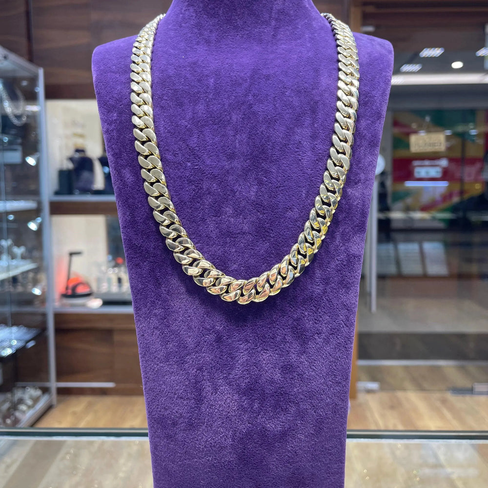 
                  
                    14ct Yellow Gold SOLID CUBAN CHAIN 22 Inches 11mm Wide 153.7g Men's NECKLACE NEW* - Sarraf Jewellers
                  
                