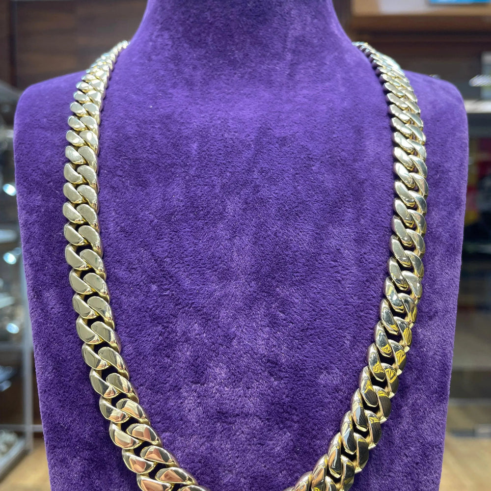 
                  
                    14ct Yellow Gold SOLID CUBAN CHAIN 22 Inches 11mm Wide 153.7g Men's NECKLACE NEW* - Sarraf Jewellers
                  
                