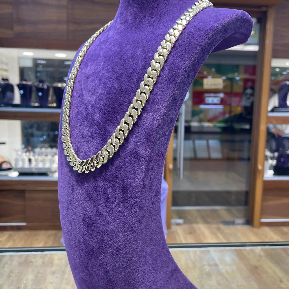 
                  
                    14ct Yellow Gold SOLID CUBAN CHAIN 22 Inches 11mm Wide 153.7g Men's NECKLACE NEW* - Sarraf Jewellers
                  
                