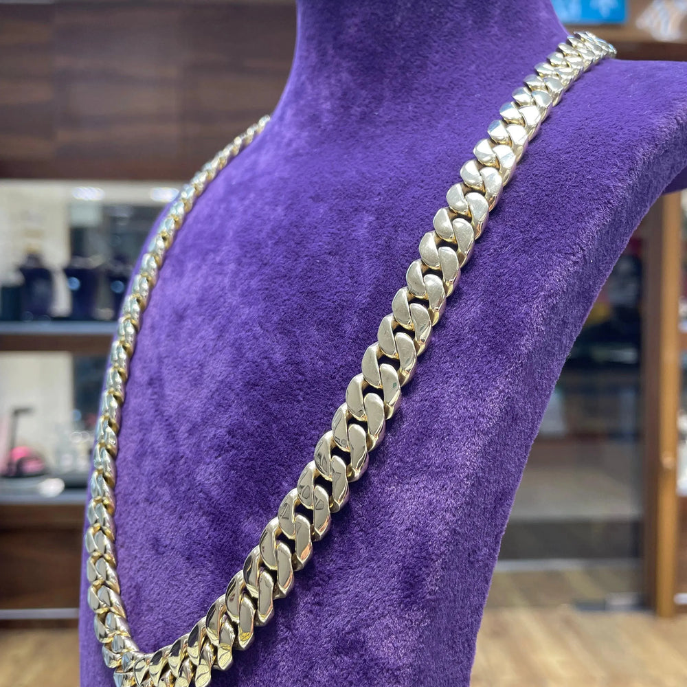 
                  
                    14ct Yellow Gold SOLID CUBAN CHAIN 22 Inches 11mm Wide 153.7g Men's NECKLACE NEW* - Sarraf Jewellers
                  
                