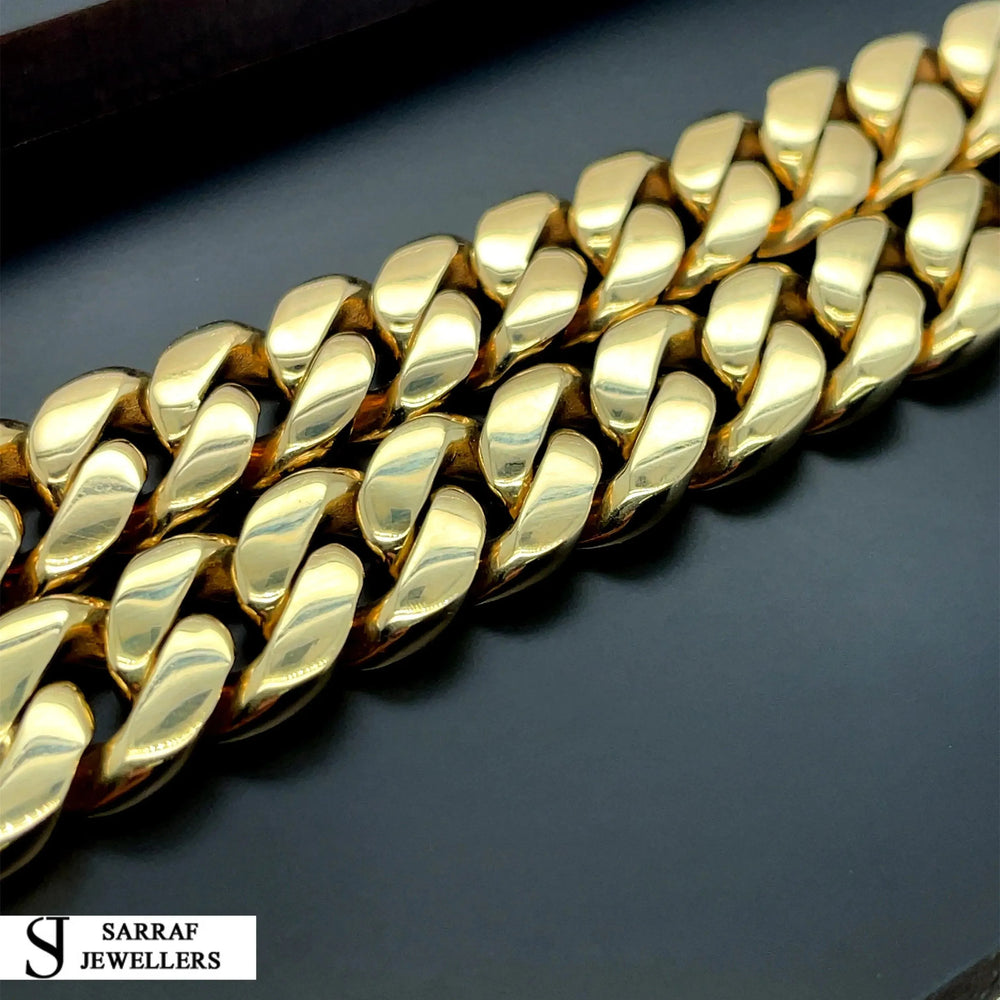 
                  
                    14ct Yellow Gold SOLID CUBAN CHAIN 22 Inches 11mm Wide 153.7g Men's NECKLACE NEW* - Sarraf Jewellers
                  
                