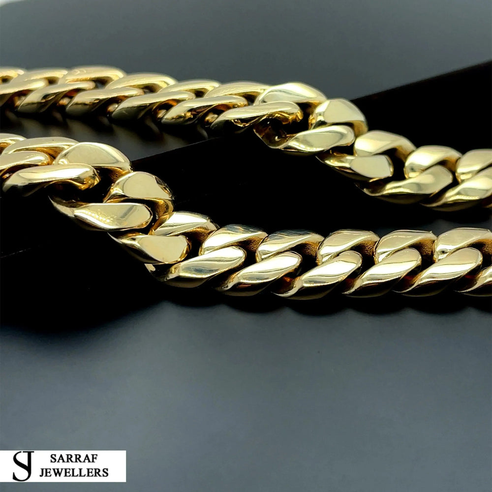 
                  
                    14ct Yellow Gold SOLID CUBAN CHAIN 22 Inches 11mm Wide 153.7g Men's NECKLACE NEW* - Sarraf Jewellers
                  
                
