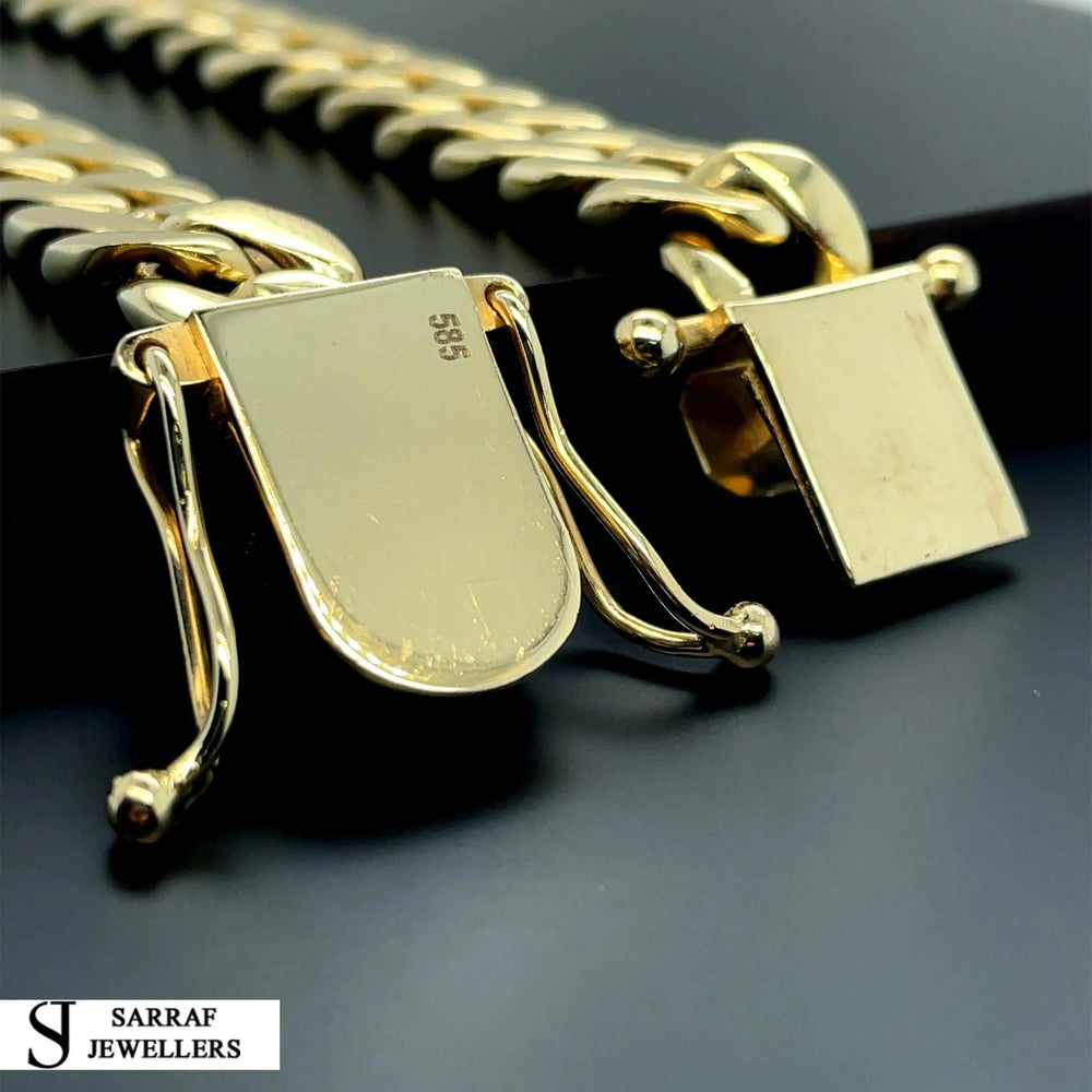 
                  
                    14ct Yellow Gold SOLID CUBAN CHAIN 22 Inches 11mm Wide 153.7g Men's NECKLACE NEW* - Sarraf Jewellers
                  
                