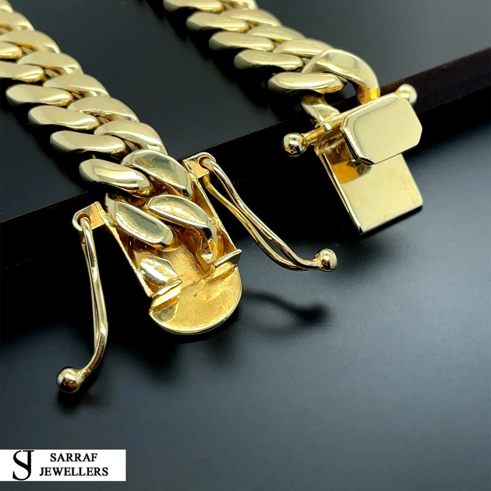 
                  
                    14ct Yellow Gold SOLID CUBAN CHAIN 22 Inches 11mm Wide 153.7g Men's NECKLACE NEW* - Sarraf Jewellers
                  
                