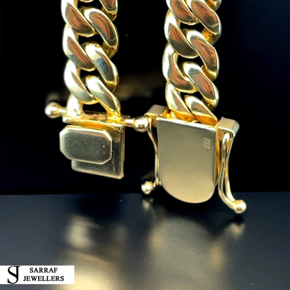 
                  
                    14ct Yellow Gold SOLID CUBAN CHAIN 22 Inches 11mm Wide 153.7g Men's NECKLACE NEW* - Sarraf Jewellers
                  
                