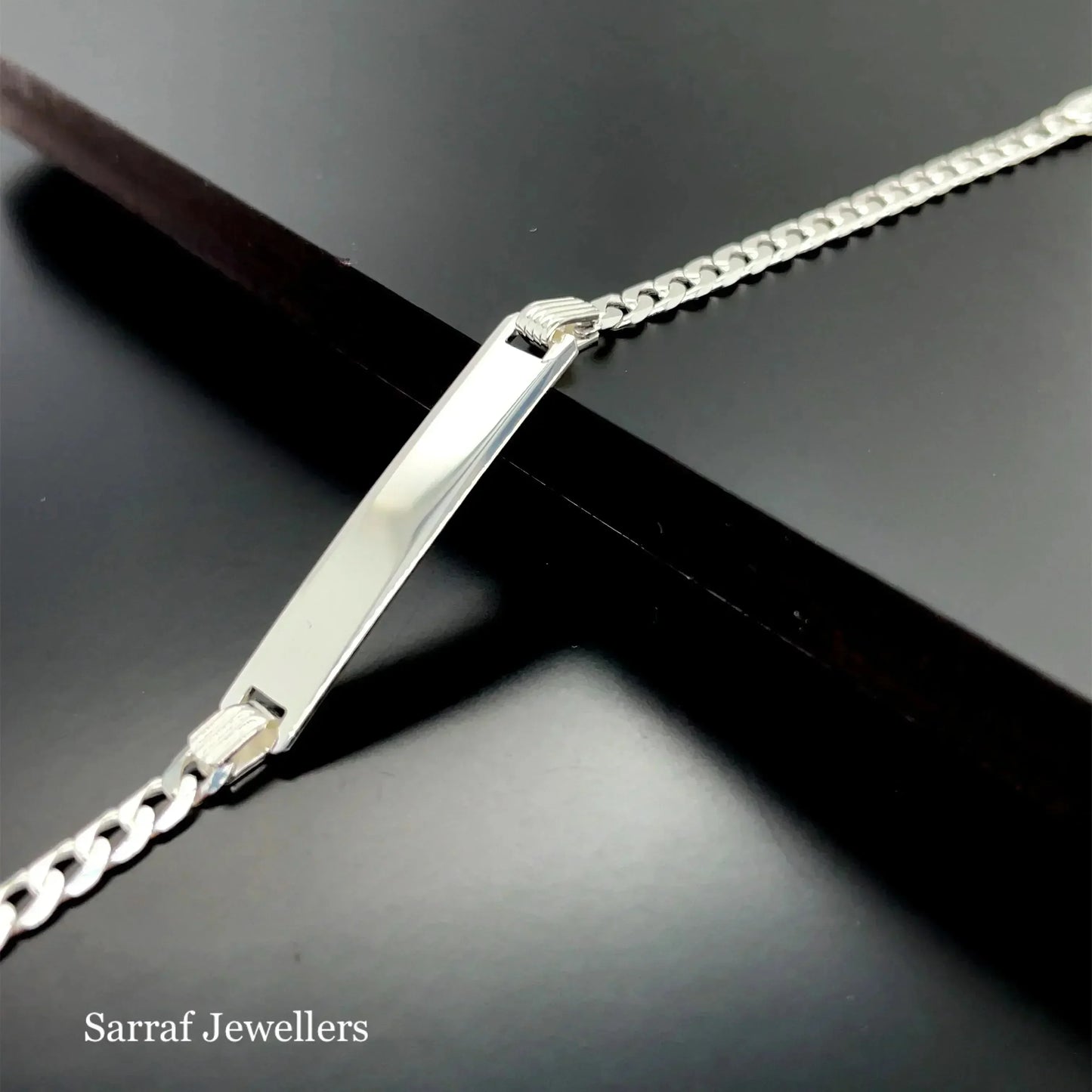 silver-baby-curb-link-id-bracelet-plain-design-free-engraving-or-shop-online-sarraf-jewellers-uk-1 - Sarraf Jewellers
